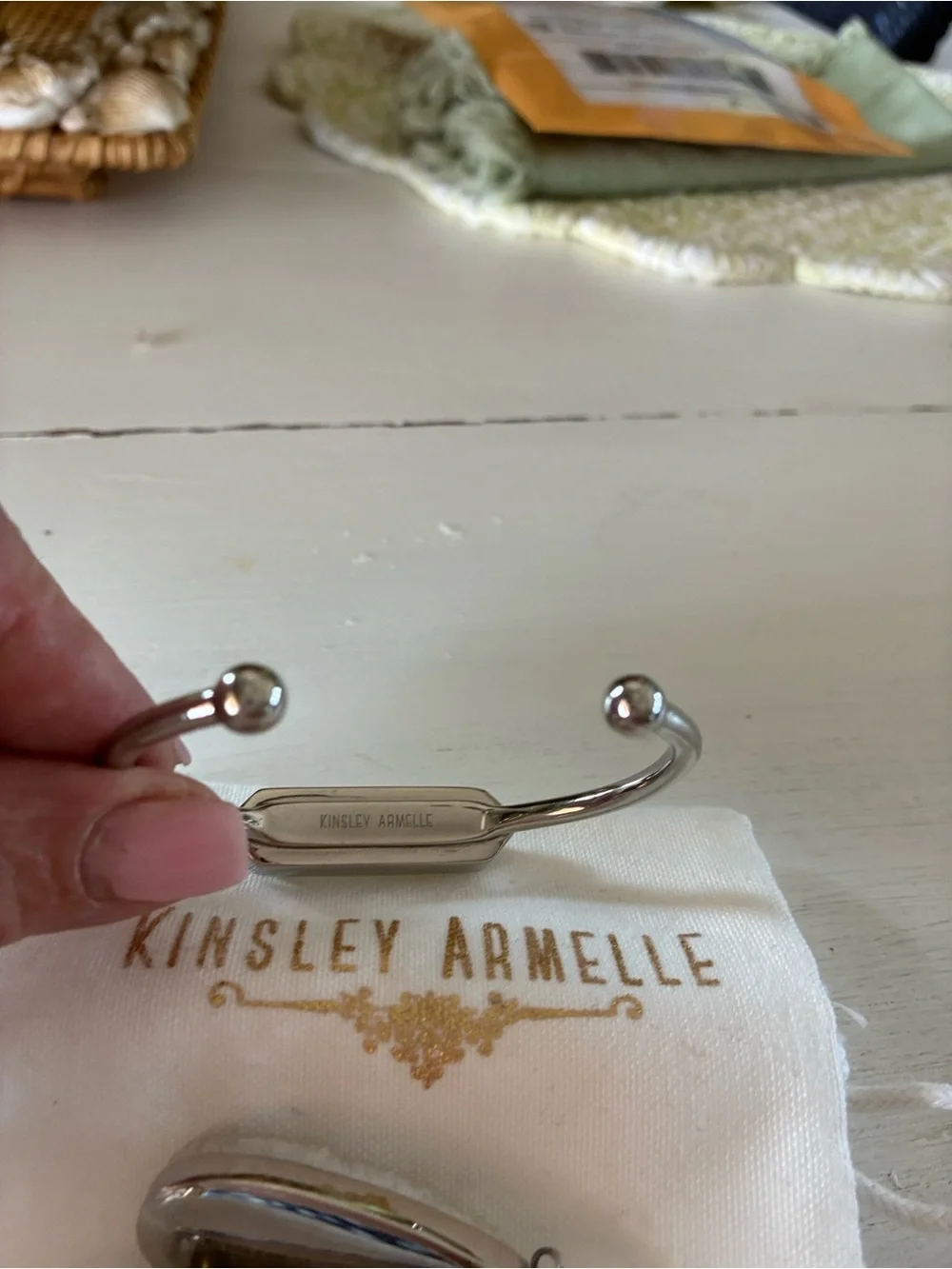 Kinsley Armelle White Druzy Teardrop Earrings and matching silver tone bracelet
